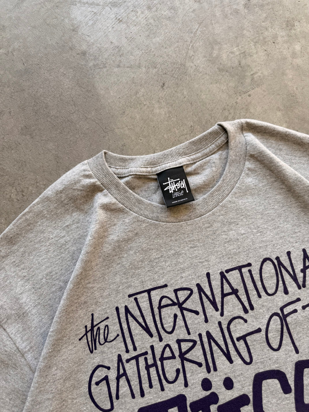 Stussy world tribe grey tee - L