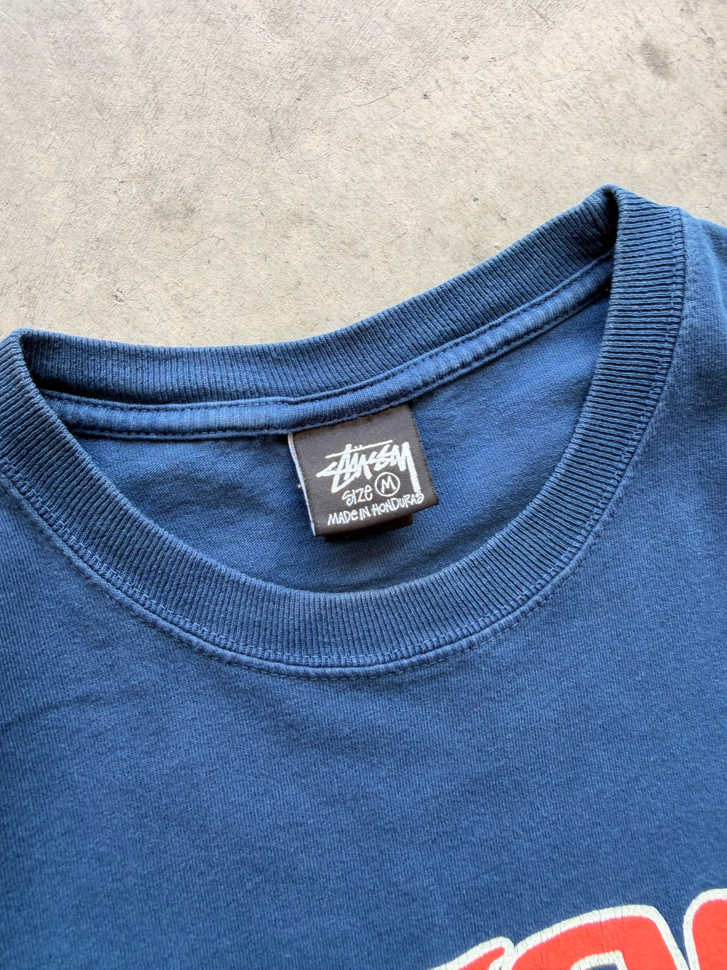 Stussy navy arch spellout - M