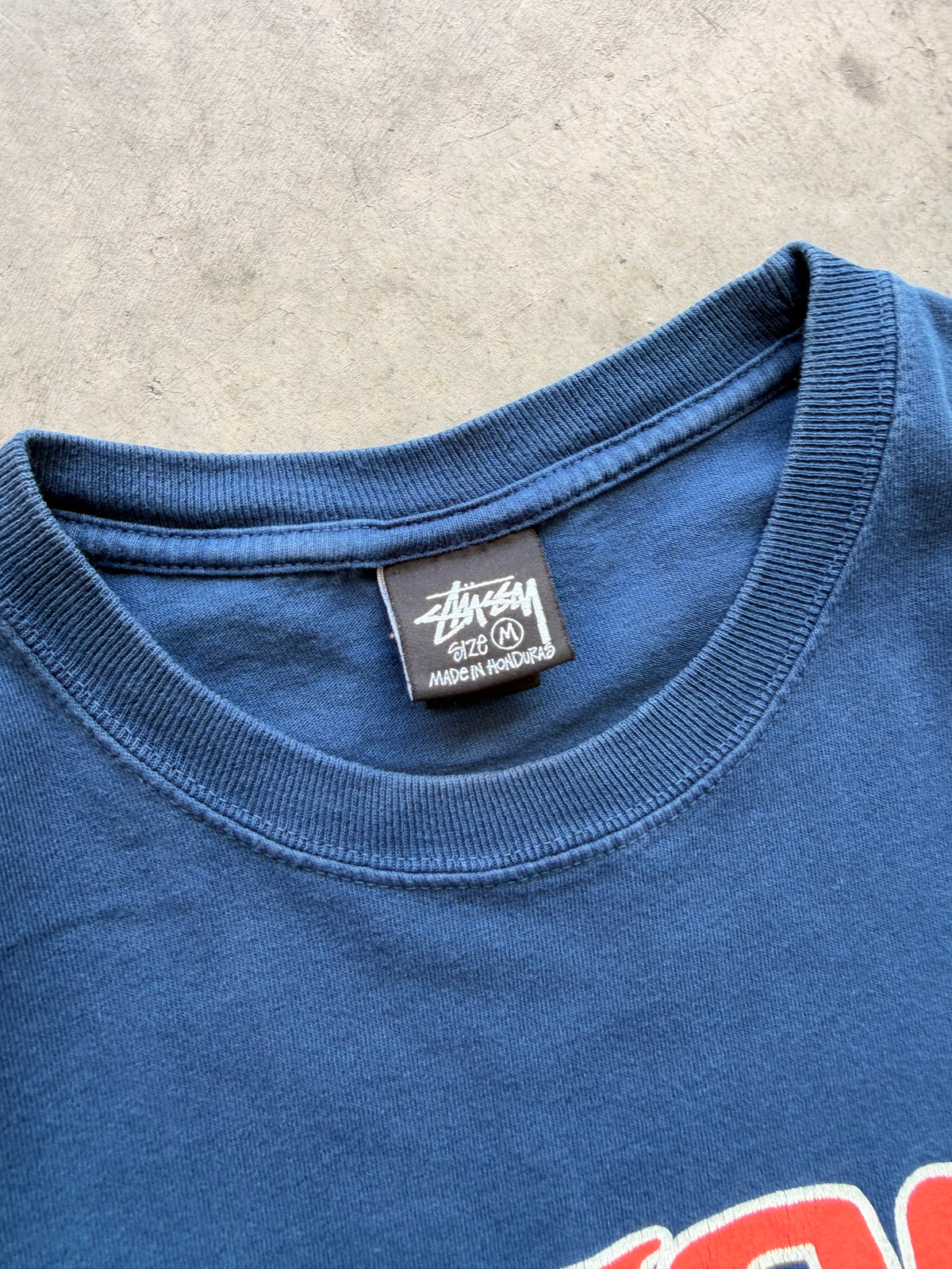 Stussy navy arch spellout - M