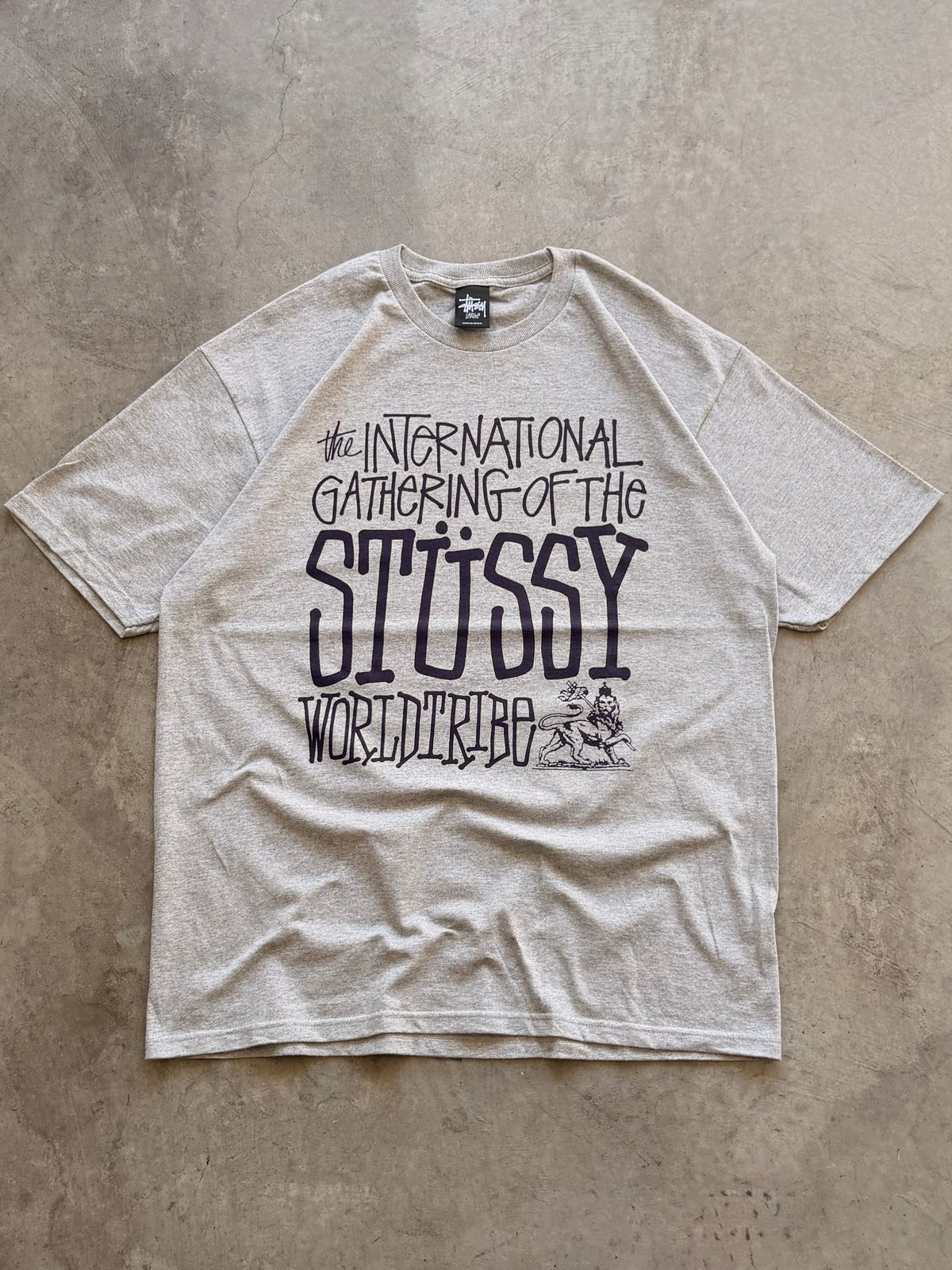 Stussy world tribe grey tee - L