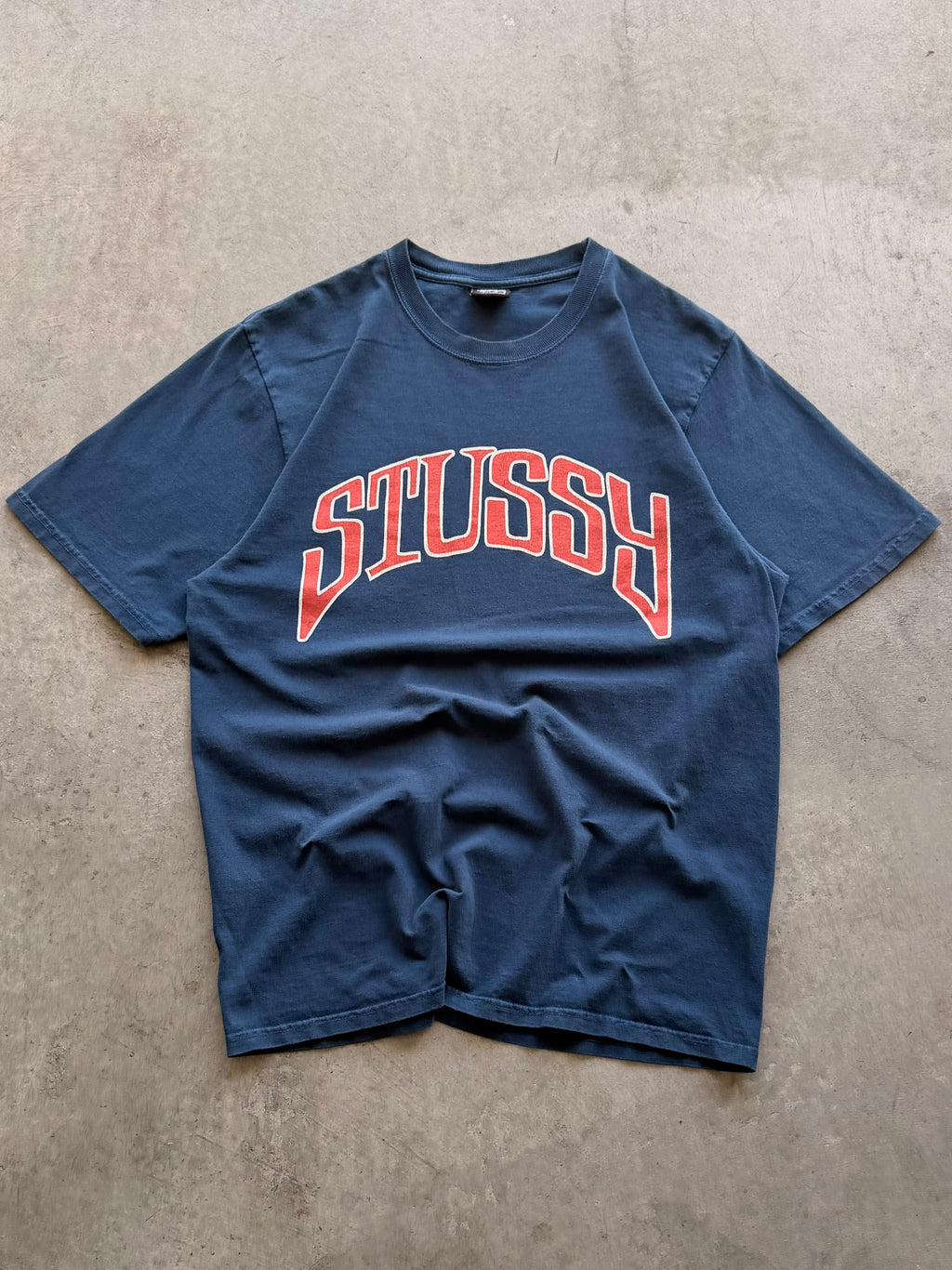 Stussy navy arch spellout - M
