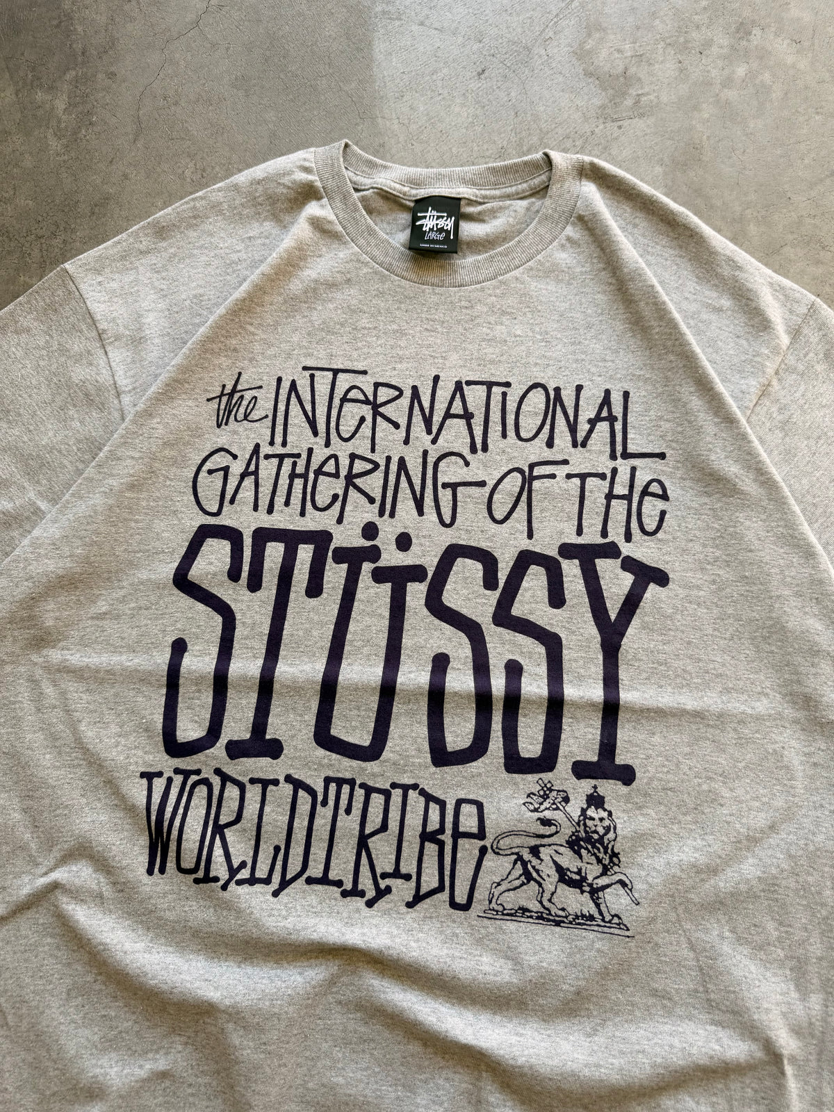 Stussy world tribe grey tee - L